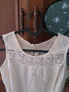 Sleeveless Top With Lace Cut-out