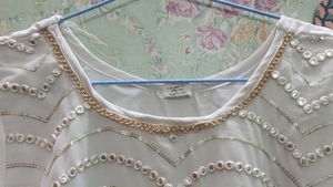 White Stars Set With Golden Work.