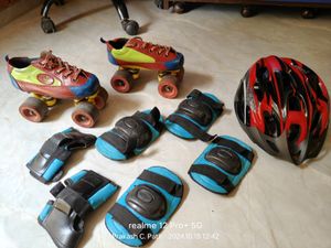 Used 7-9 Years Roller Skates &amp; Safety Kit Includes