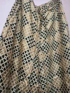 Rangmanch Beige Printed Flared Palazzo