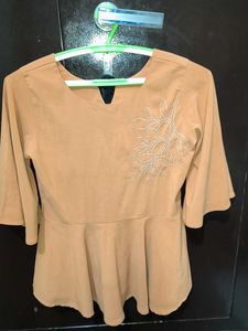 Elegant Tan Peplum Top