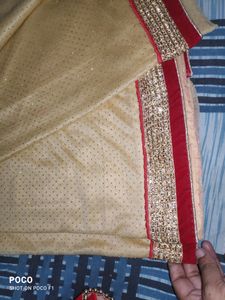pretty red golden saree.