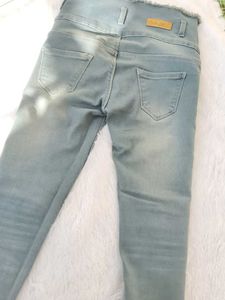 Ripped High-Waisted Jeans