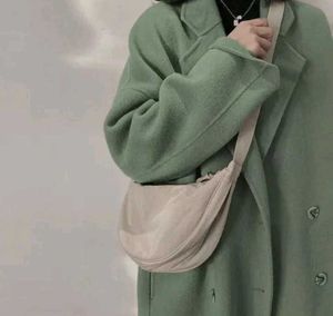 Cream-colored Slingbags