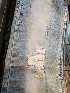 Distressed Denim Jeans