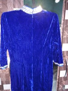 beautiful blue velvet dress knows as Chinese dres
