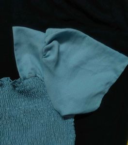Blue Smocked Peplum Top