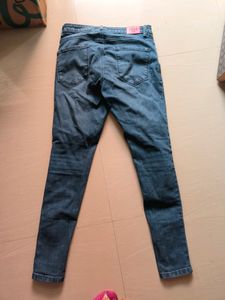 Distressed Denim Jeans