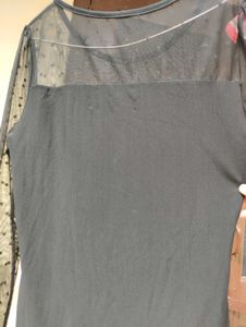 Black Coloured Top With Net On Neck And Arms