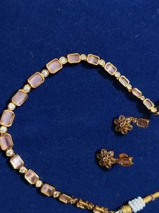 light pink neckpiece