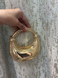 Gold Statement Handle Bag