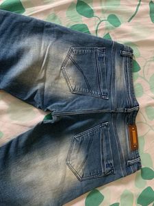 Distressed Wash Denim Jeans