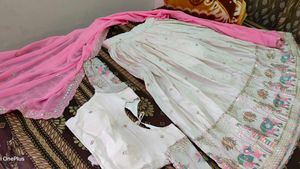 Off White Lehnga With Pink Dupatta