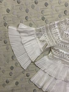 White Embroidered Ruffle Top
