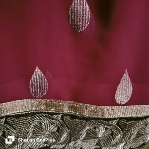 Heavy Zaria work, elegant maroon saree