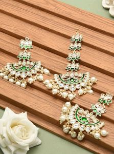 Zaveri Pearls Earrings and Maang Tikka Set