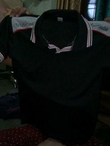 Black Polo Shirt with Striped Collar