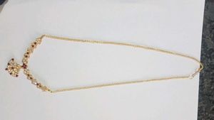 Elegant Gold Necklace With Maroon Stone