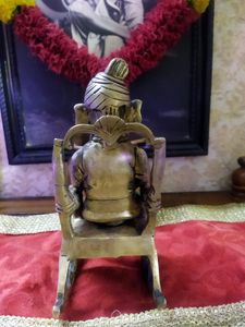 Ganesh Sitting On A Rocking Chair Idol