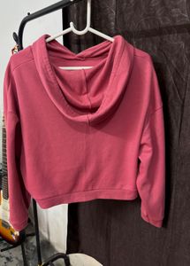 pink cropped length hoodie
