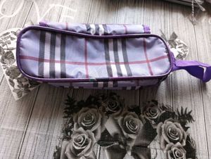 Stylish purple plaid waist bag.