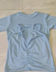 A Blue Crop Top With Crochet