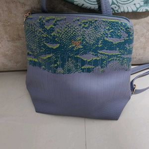 Baggit Textured Blue Backpack Bag