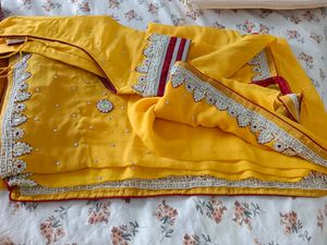 heavy work yellow saree no use