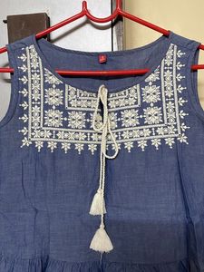 Peplum Top With Embroidery