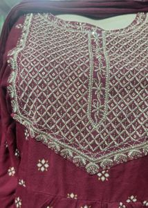 Maroon three piece suit