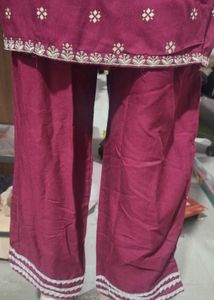 Maroon three piece suit