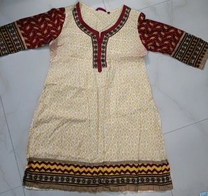 PRICE DROP : L cream knee length kurti