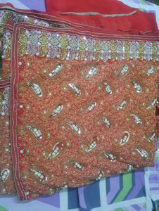 red saree for bride with heavy work