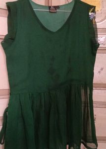 Short Green Top With Embroidery .