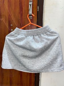 Girl&#39;s Gray Skirt with Blue Ribbon