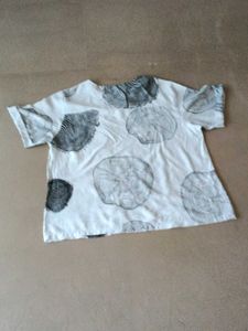 White Breezy top But one Sleeves Has flaws