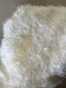 big white fuzzy sweater