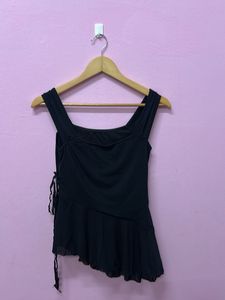 black asymmetrical top with zip on the side