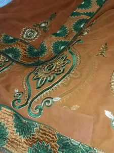 Brown Sarree With Free Stiched Blouse