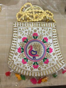 Embroidered Handbag with Peacock Design
