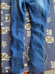 Distressed Lace-Up Jeans