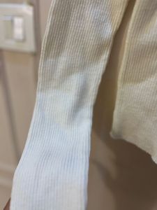 combo of white ribbed shirt and cotton shorts