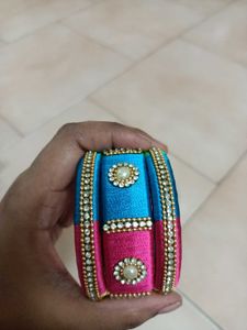 2 Sets Of Multi Colour Thread Bangles