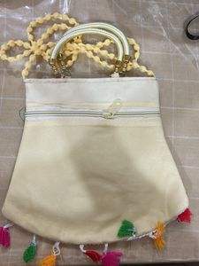 Embroidered Handbag with Peacock Design