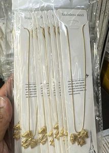 Anti Tarnish Gold Heart &amp; Bow Necklace