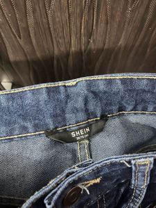 Dark blue bootcut jeans