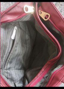 TWO WOMAN BRANDED LEATHER HANDBAGS