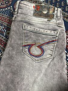 Grease Denim Distressed Jeans