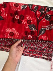 new red printed saree