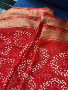 Red synthetic saree with blouse